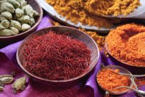 Closeup view of assorted spices in small containers — Stock Photo