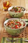 Two bowls of rice with chopped beef — Stock Photo