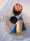 Closeup view of shrimp cocktail with baguette — Stock Photo