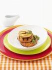 Closeup view of grilled peaches with herb sauce — Stock Photo