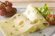 Emmental cheese with chives — Stock Photo