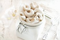 Vanilla crescent biscuits in jar — Stock Photo
