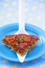 Slice of tomato tart on a cake slice — Stock Photo