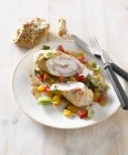 Turkey roulade with vegetables  on white plate with fork and knife — Stock Photo