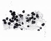 Blackberries and splash of water — Stock Photo