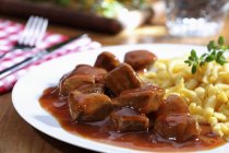Veal goulash with Sptzle — Stock Photo