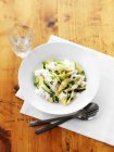 Shell pasta with courgettes and cheese — Stock Photo