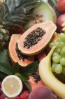 Various halved fruits — Stock Photo