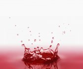 Schizzo di succo rosso — Foto stock