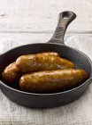 Pan fried sausages — Stock Photo
