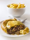Beef pasty with french fries — Stock Photo