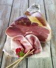 Partly sliced Air-cured ham — Stock Photo