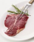 Raw T-bone steak — Stock Photo