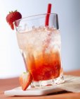 Strawberry caipirinha in glass — Stock Photo