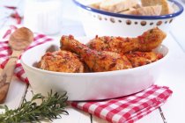 Roasted chicken drumsticks with chilli — Stock Photo