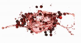 Cranberries com salpicos de suco — Fotografia de Stock