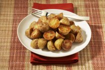 Plate of Roasted New Potatoes — Stock Photo
