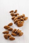Fresh brown almonds — Stock Photo