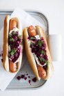 Hot dogs with beetroot and dill — Stock Photo