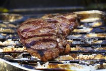 T-bone steak in tray — Stock Photo