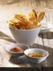 Potato chips with pepper salt — Stock Photo
