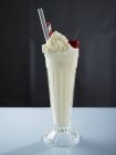 Milkshake topped with cream — Stock Photo