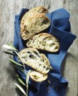 Slices of olive ciabatta — Stock Photo