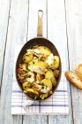 Roasted dish with potatoes and chicken — Stock Photo