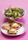 Goat's cheese and raspberry tartlets — Stock Photo