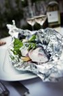 Raw Trout wrapped in aluminium foil — Stock Photo