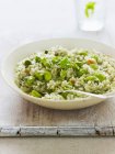 Pea risotto with broad beans — Stock Photo