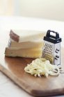 Cheese on chopping board — Stock Photo