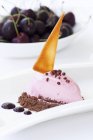 Cherry ice cream with grated chocolate — Stock Photo