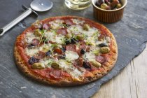 Chorizo and olive pizza — Stock Photo