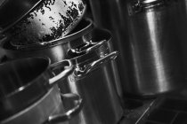 Closeup view of piled metal pots — Stock Photo