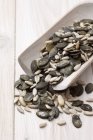 Sunflower seeds on scoop — Stock Photo