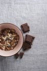 Bowl of chocolate muesli — Stock Photo