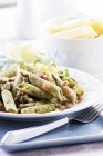 Penne pasta with spinach — Stock Photo