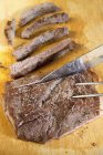 Slicing Steak on Board — Stock Photo