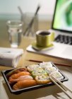 Maki and nigiri sushi in plastic tray — Stock Photo