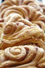 Closeup view of sweet puff pastries in heap — Stock Photo