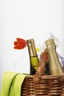 Bottle of champagne and a bottle of wine — Stock Photo