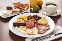 Closeup view of English breakfast and coffee — Stock Photo