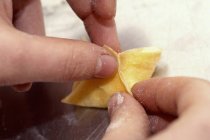 Tortellini pasta being folded — Stock Photo