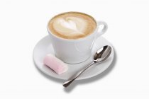 Capucino in cup with a marshmallow — Stock Photo
