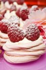 Pink meringues with cream — Stock Photo