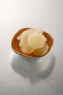 Closeup view of bowl of candied ginger — Stock Photo