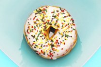 Frosted Doughnut with Sprinkles — Stock Photo