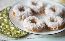 Coconut Doughnuts on plate — Stock Photo