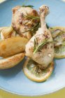 Lemon chicken legs with rosemary — Stock Photo